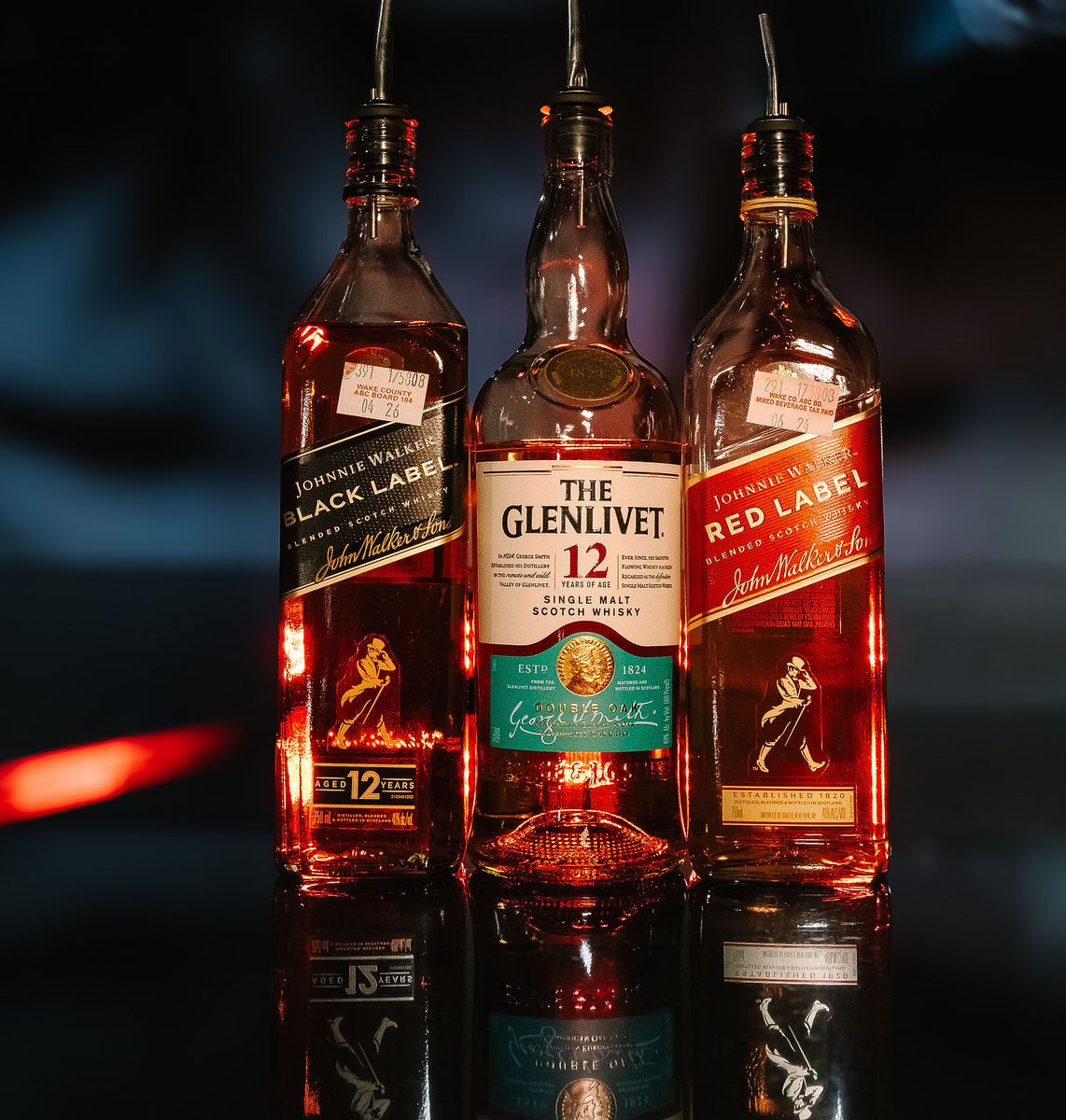 Johnnie Walker Black Label, Glenlivet 12, and Red Label scotch at the Capital Cabaret bar