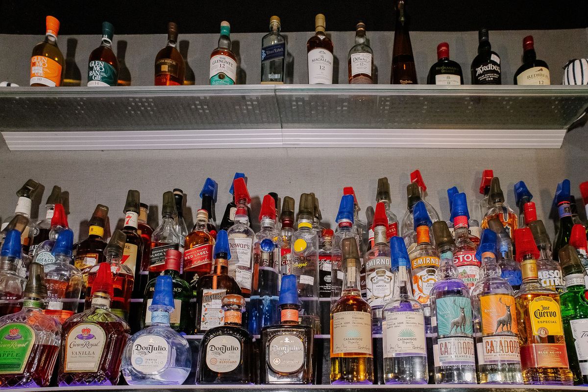 Top-shelf liquor wall at the Capital Cabaret bar